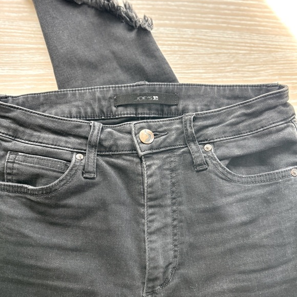 Joe’s black denim with distressed at the bottom - Picture 2 of 3